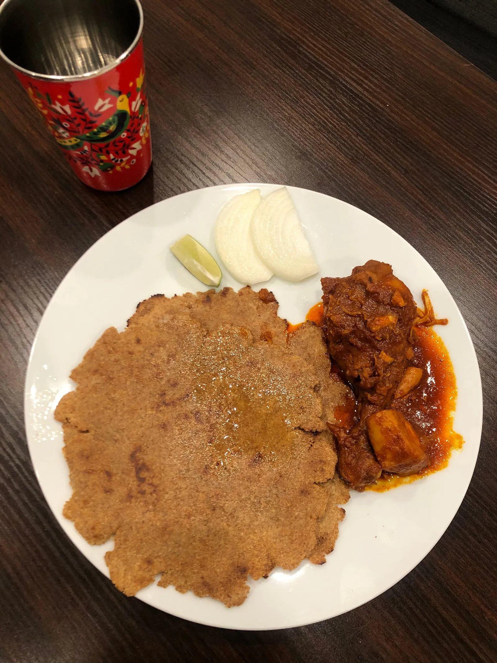 Flaxseed roti with butter chicken curry